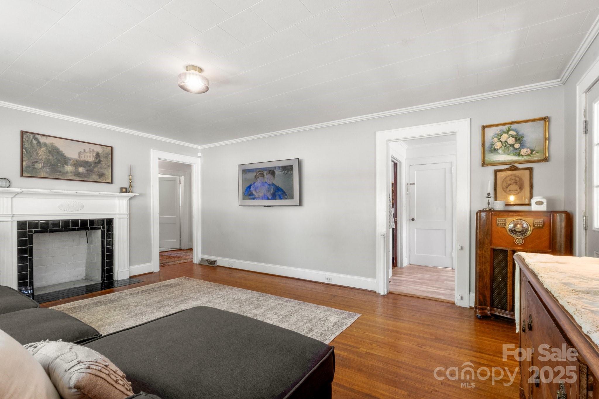 300 Cook Street Kannapolis, NC 28083 - Photo 7 of 40 a living room with furniture and a fireplace