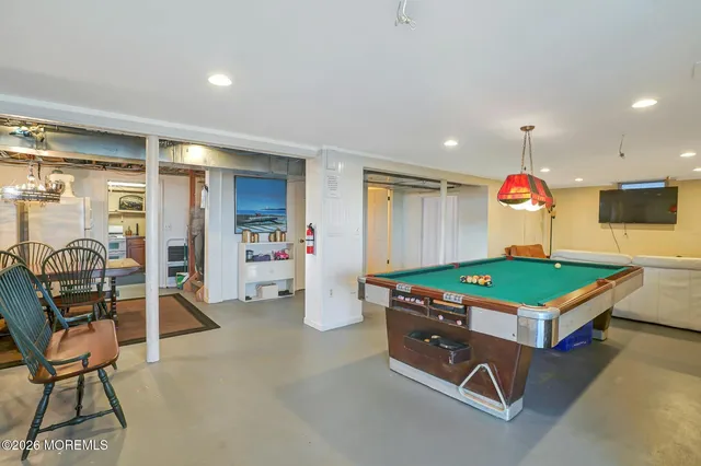 a front view of a residential apartment building with a yard