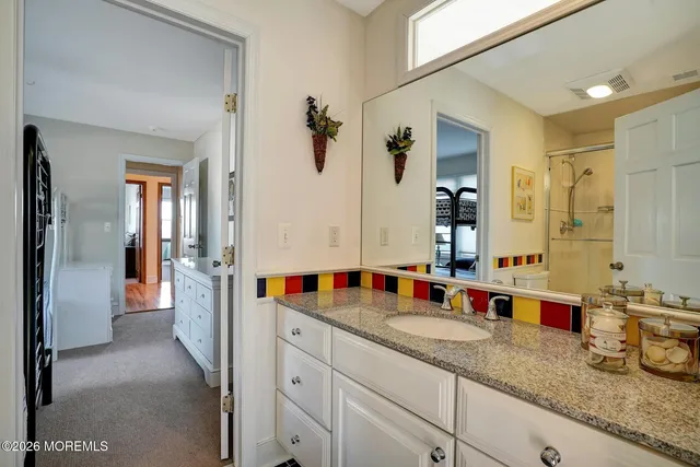 a picture of a wall with a white wall and a white refrigerator