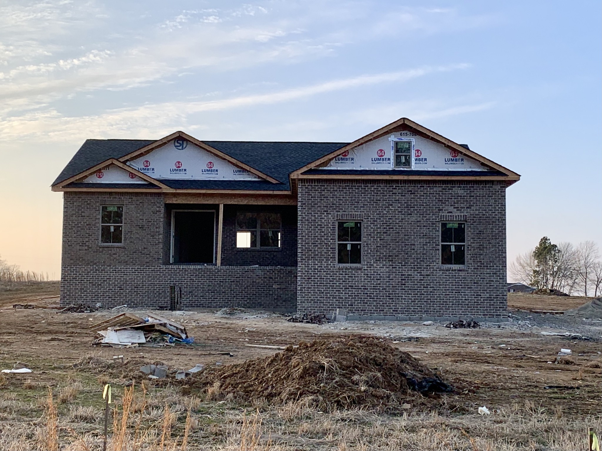 111 Perdue Cemetery Road Portland, TN 37148 - Photo 1 of 15 a front view of a house with a yard
