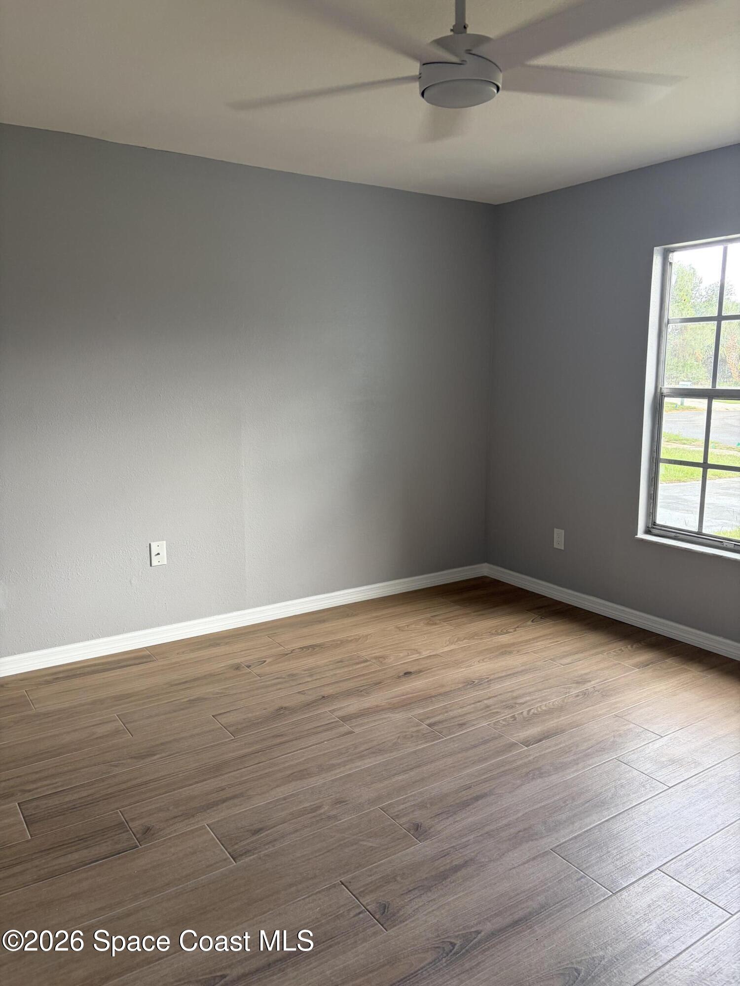 1136 Minnet Court Northeast Palm Bay, FL 32905 - Photo 27 of 31 Living room 2