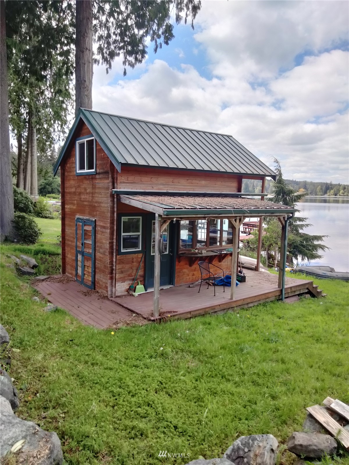 19527 Lerch Road Snohomish, WA 98290 - Photo 24 of 39 a view of a house with a yard porch and sitting area