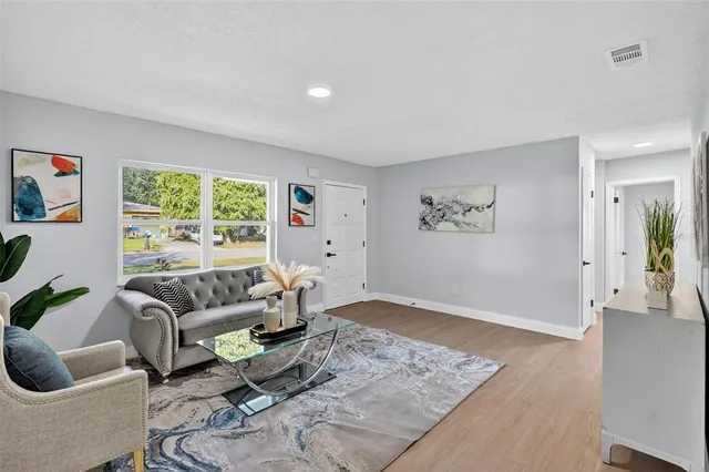 a living room with furniture and rug