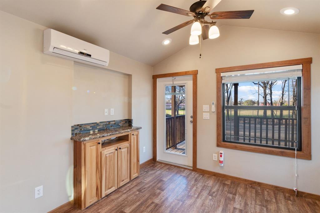 6801 Fm 1616 Athens, TX 75752 - Photo 13 of 28 wooden floor in an empty room with a window