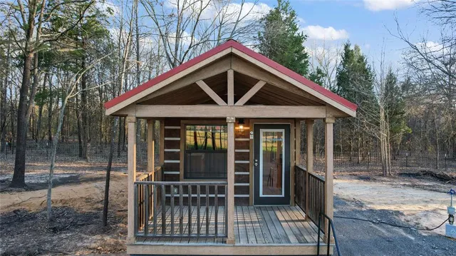 a view of living room and wooden floor