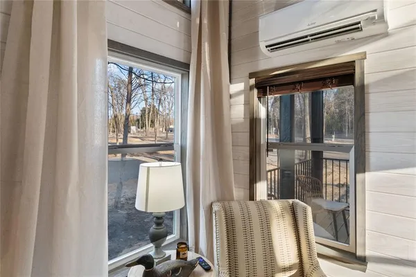 a bathroom with a shower and a mirror