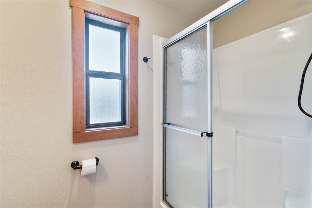 6801 Fm 1616 Athens, TX 75752 - Photo 16 of 28 a bathroom with a shower and a mirror