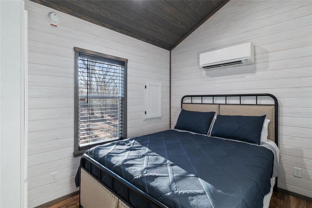 6801 Fm 1616 Athens, TX 75752 - Photo 17 of 28 a bedroom with a bed and a window