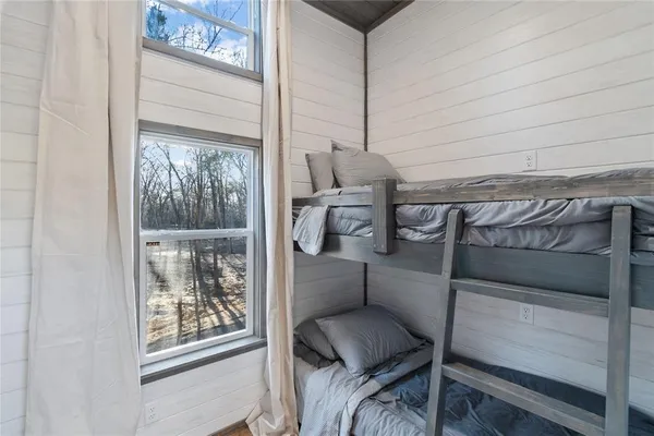 a kitchen with granite countertop a stove and a refrigerator