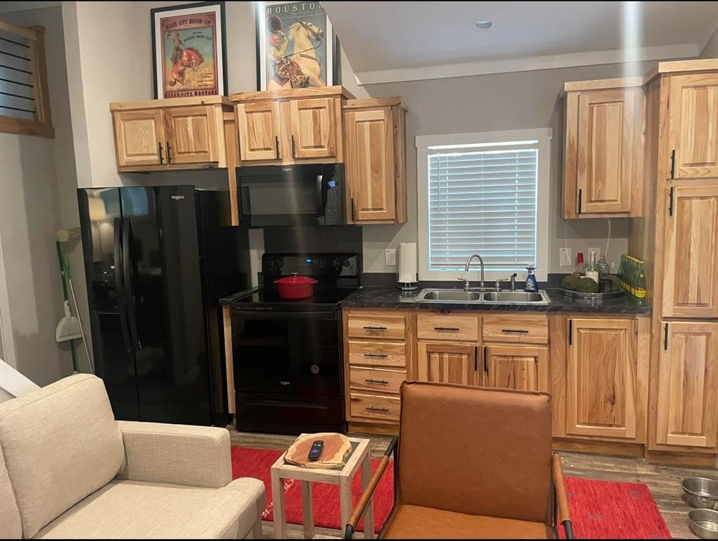 6801 Fm 1616 Athens, TX 75752 - Photo 25 of 28 a kitchen with stainless steel appliances granite countertop a refrigerator and a stove top oven