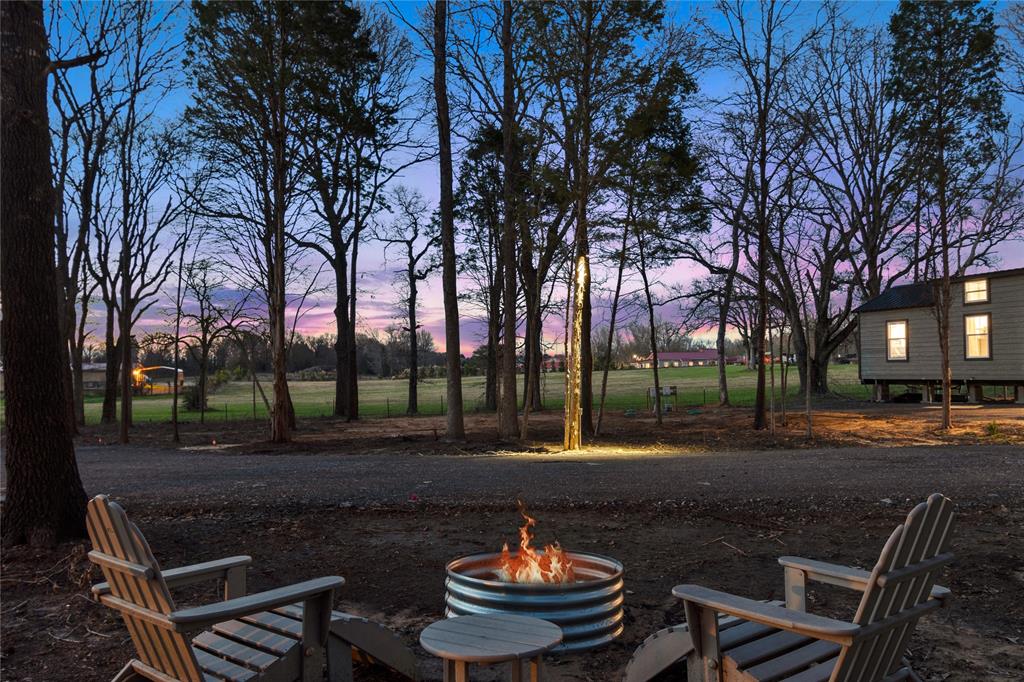 6801 Fm 1616 Athens, TX 75752 - Photo 28 of 28 a backyard of a house with barbeque oven and outdoor seating