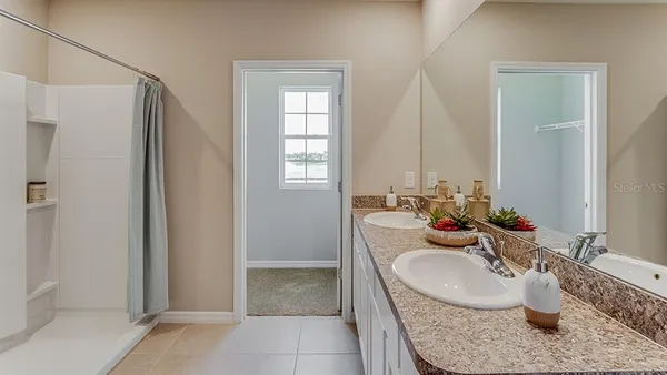 a dining room with table and chairs