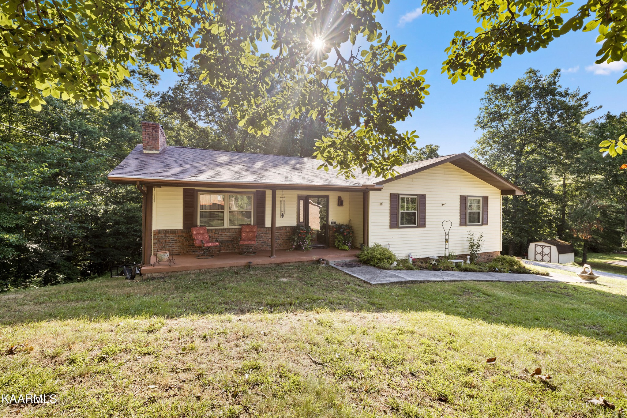 242 Mountain View Drive Rutledge, TN 37861 - Photo 3 of 28 a front view of a house with a yard