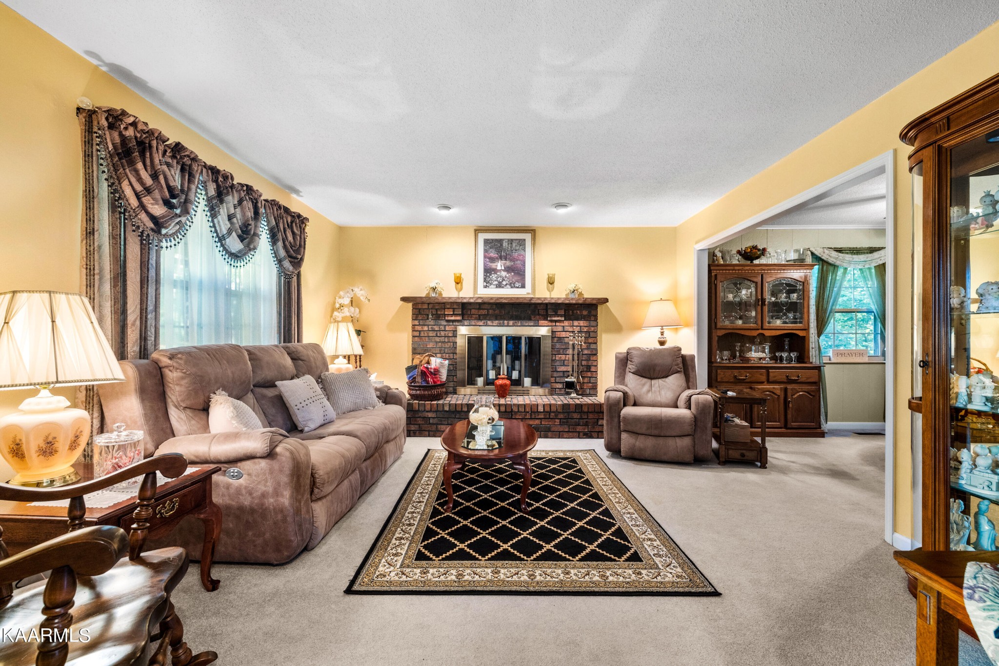 242 Mountain View Drive Rutledge, TN 37861 - Photo 4 of 28 a living room with furniture and a fireplace