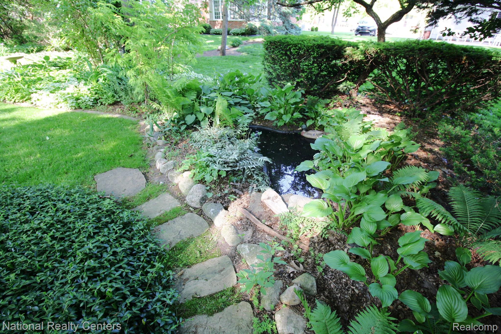 3588 Salem Road Troy, MI 48084 - Photo 25 of 28 Pond located in corner of backyard.