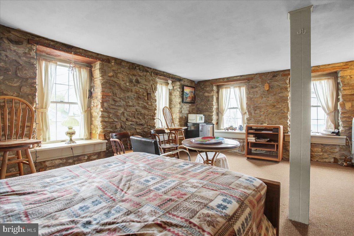 4 Baldy Hill Road Boyertown, PA 19512 - Photo 11 of 51 a bedroom with a bed and wooden floor