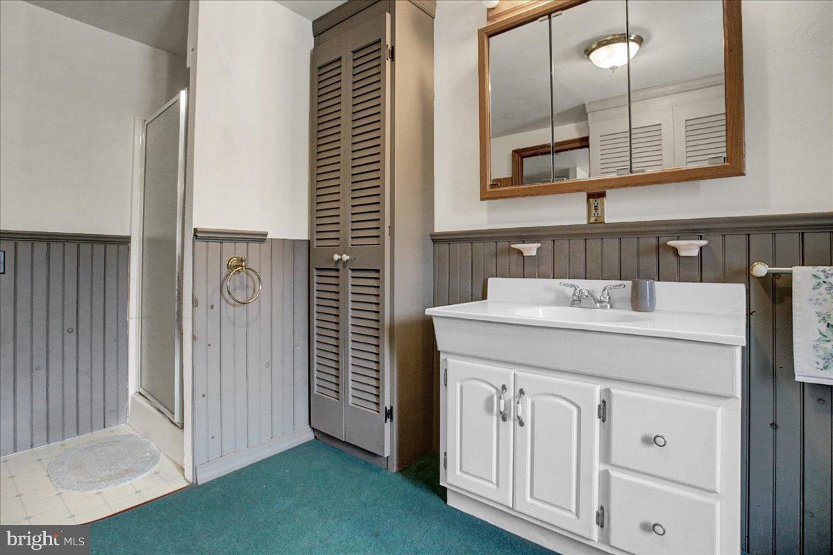 4 Baldy Hill Road Boyertown, PA 19512 - Photo 16 of 51 a bathroom with a sink and a mirror