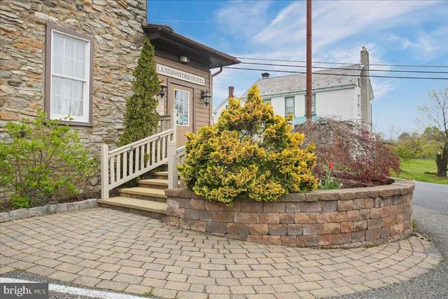 a view of a porch with a potted plant