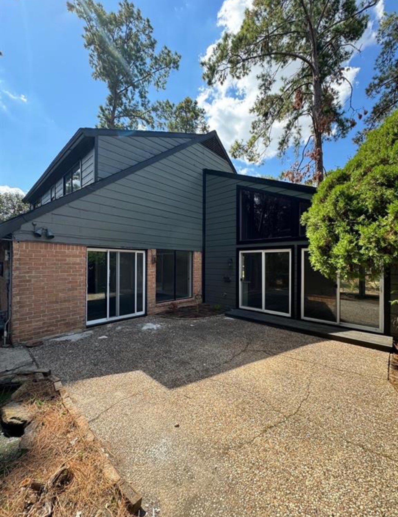 8143 Northbridge Drive Spring, TX 77379 - Photo 24 of 30 a front view of a house with a yard and garage