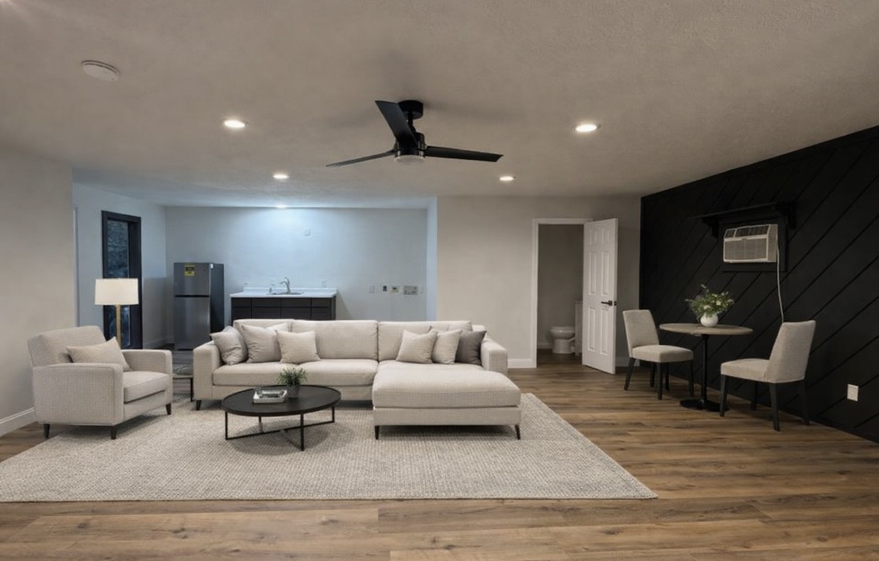 8143 Northbridge Drive Spring, TX 77379 - Photo 25 of 30 a living room with furniture and a wooden floor