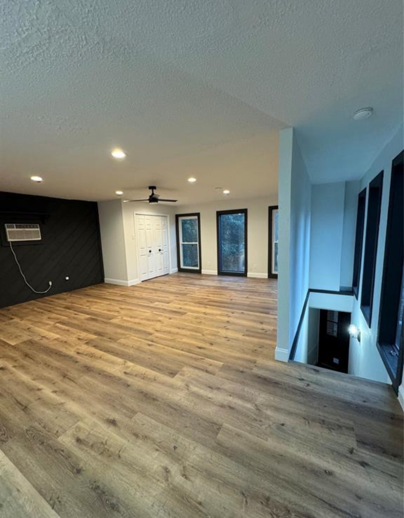 8143 Northbridge Drive Spring, TX 77379 - Photo 28 of 30 a view of an empty room with kitchen and a window
