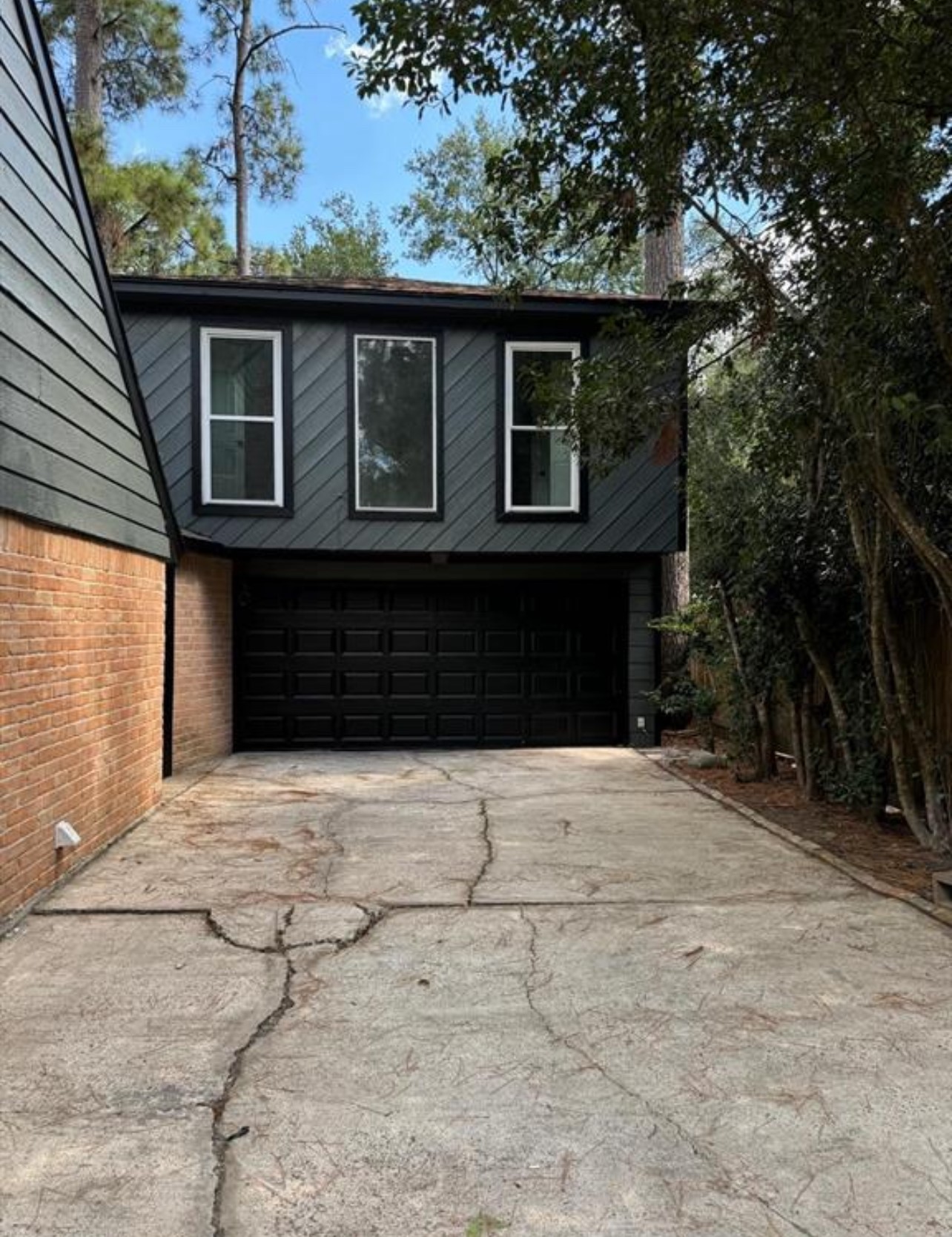 8143 Northbridge Drive Spring, TX 77379 - Photo 29 of 30 a front view of a house with a yard