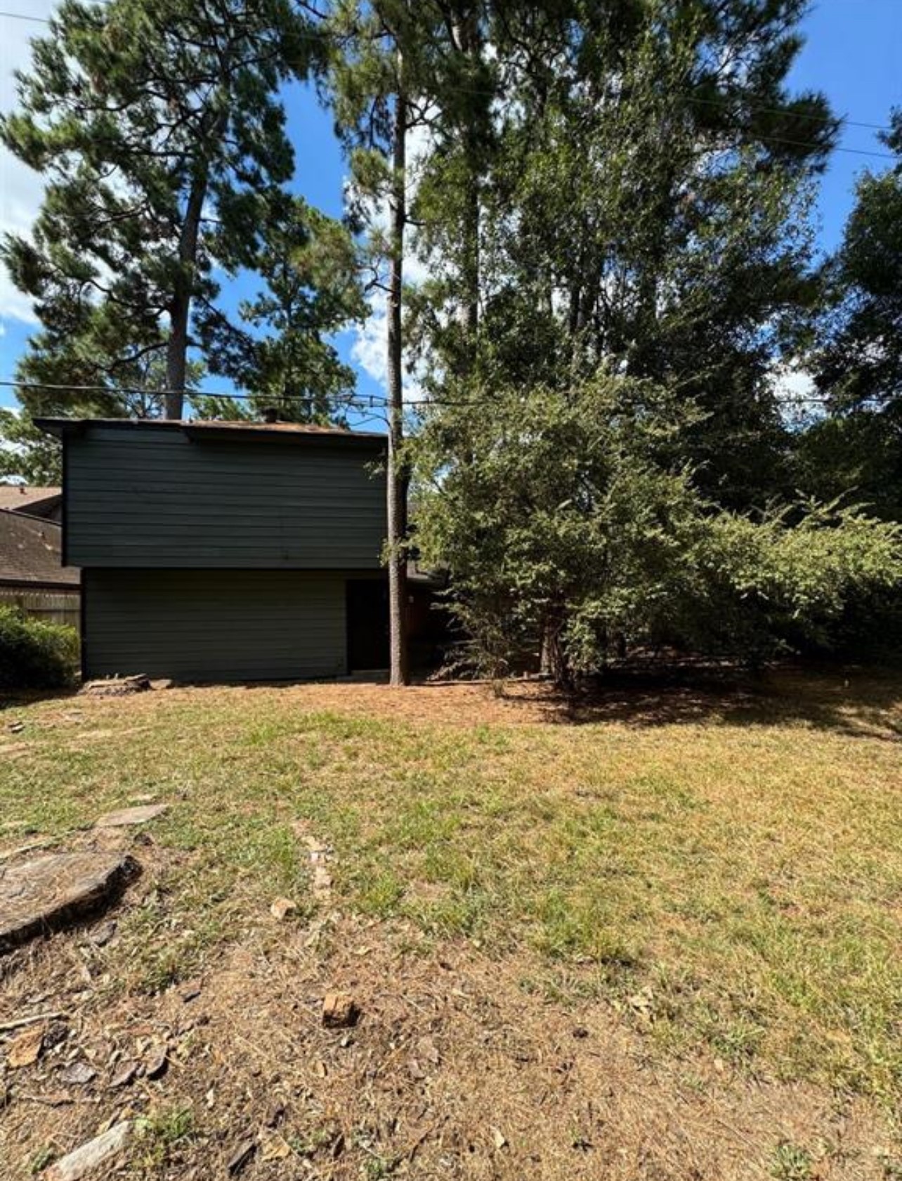 8143 Northbridge Drive Spring, TX 77379 - Photo 30 of 30 a house with trees in front of it
