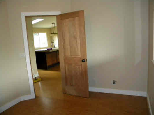 6392 Kalama Road, Unit 4 Kapaa, HI 96746 - Photo 20 of 24 a view of a hallway with wooden floor
