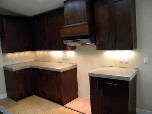 6392 Kalama Road, Unit 4 Kapaa, HI 96746 - Photo 2 of 24 a kitchen with a sink and a microwave