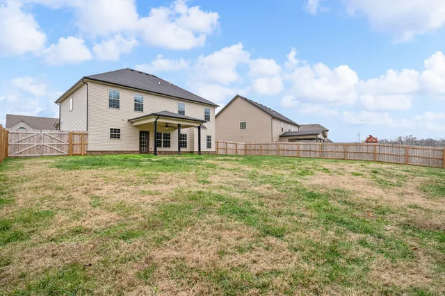 a house view with a outdoor space