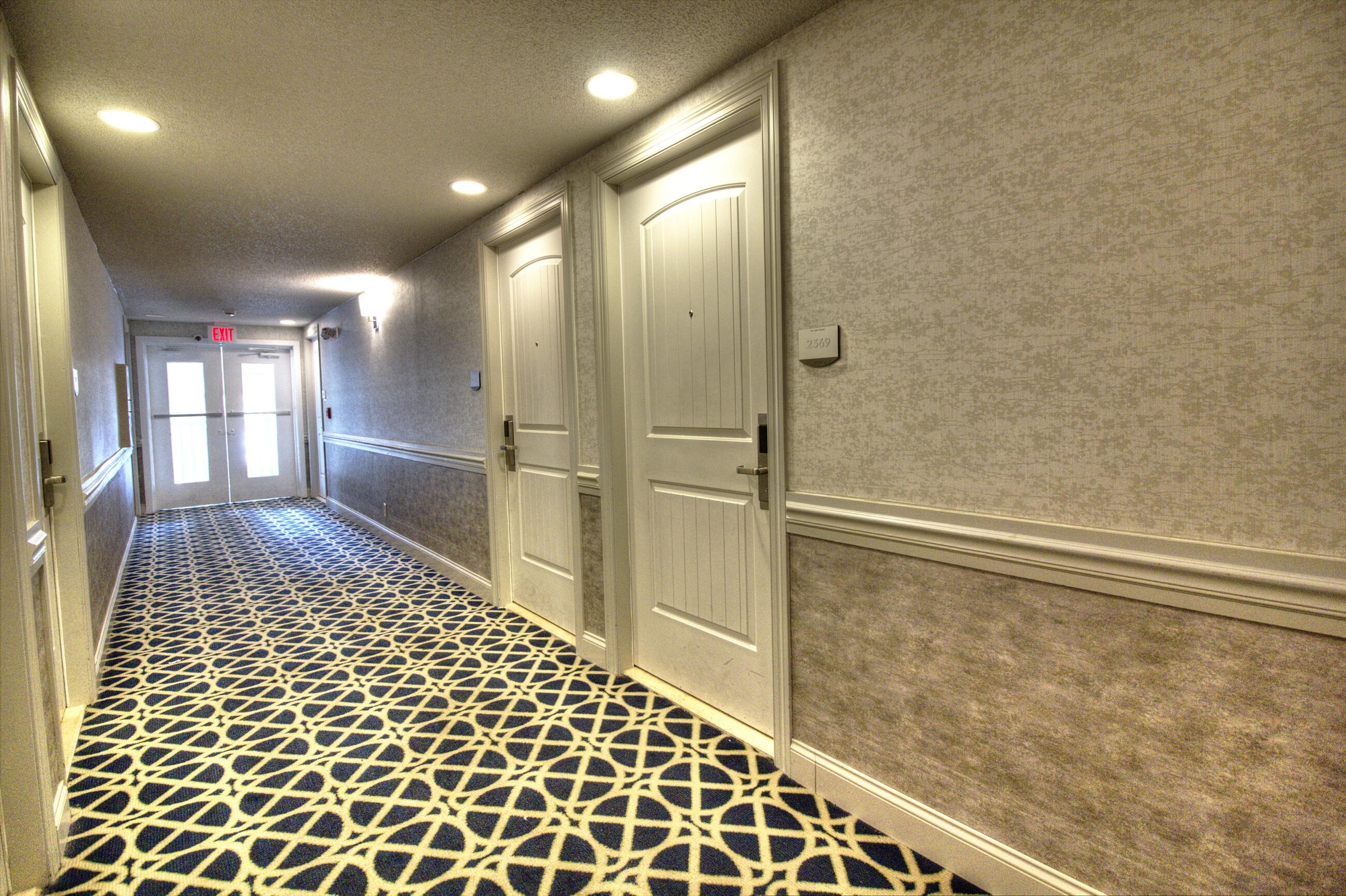 269 Fontana Boulevard, Unit 2369 Fontana, WI 53125 - Photo 14 of 17 Hallway-1