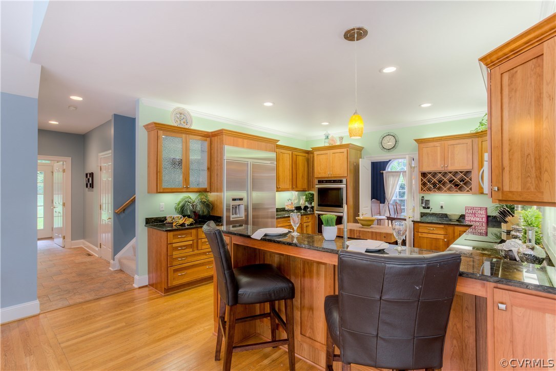 3613 Salles Ridge Court Midlothian, VA 23113 - Photo 12 of 36 a room with lots of furniture and wooden floor