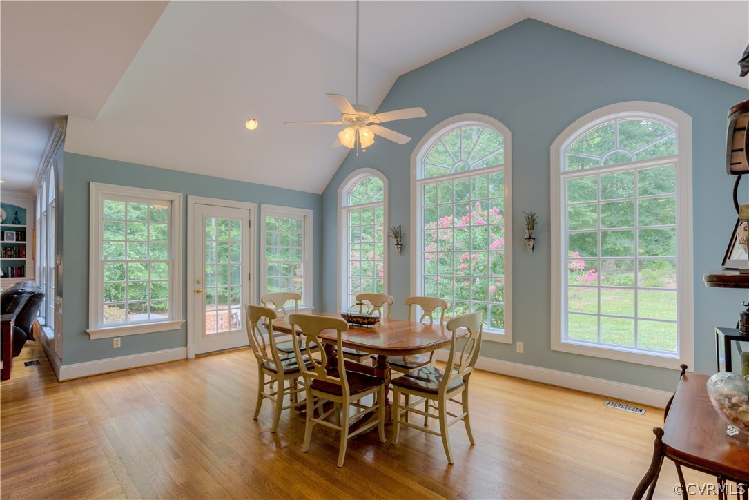 3613 Salles Ridge Court Midlothian, VA 23113 - Photo 13 of 36 a view of a dining room with furniture window and wooden floor
