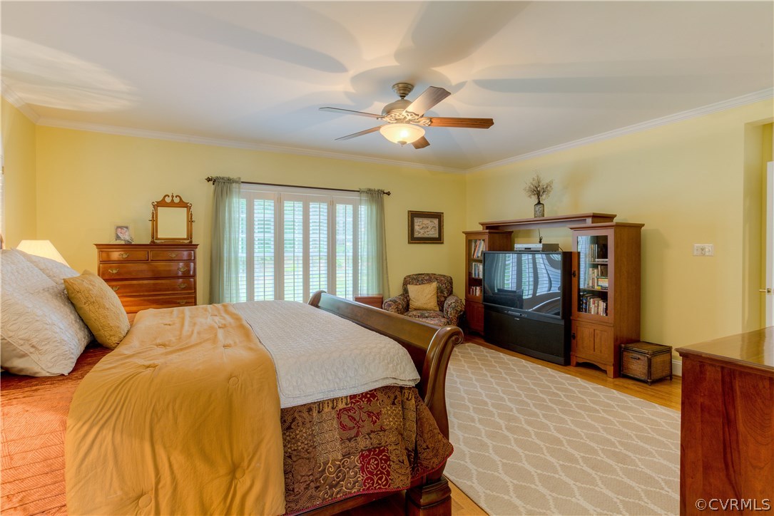3613 Salles Ridge Court Midlothian, VA 23113 - Photo 20 of 36 a bedroom with a bed dresser and a window