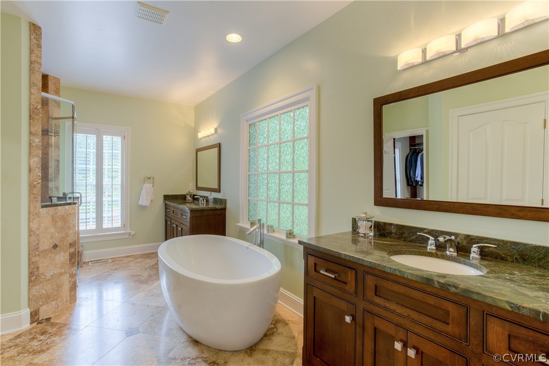 3613 Salles Ridge Court Midlothian, VA 23113 - Photo 21 of 36 a bathroom with a granite countertop sink and a mirror