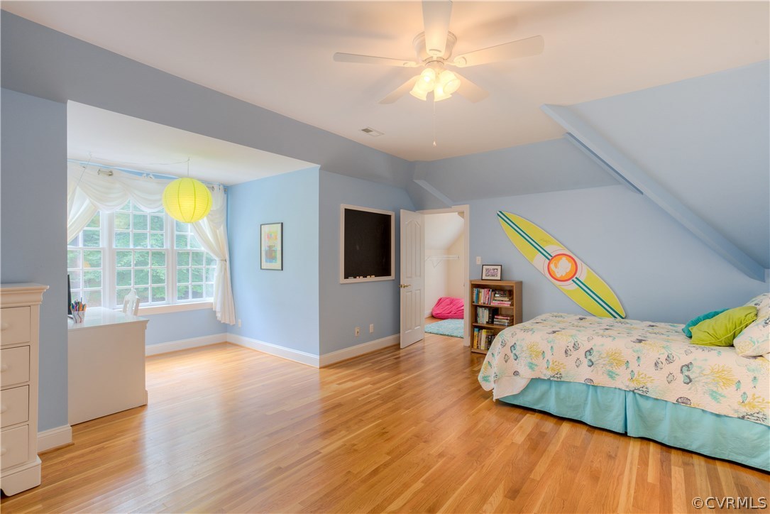 3613 Salles Ridge Court Midlothian, VA 23113 - Photo 25 of 36 a bedroom with bed and wooden floor