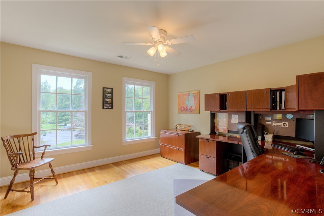 3613 Salles Ridge Court Midlothian, VA 23113 - Photo 27 of 36 a living room with furniture and a flat screen tv