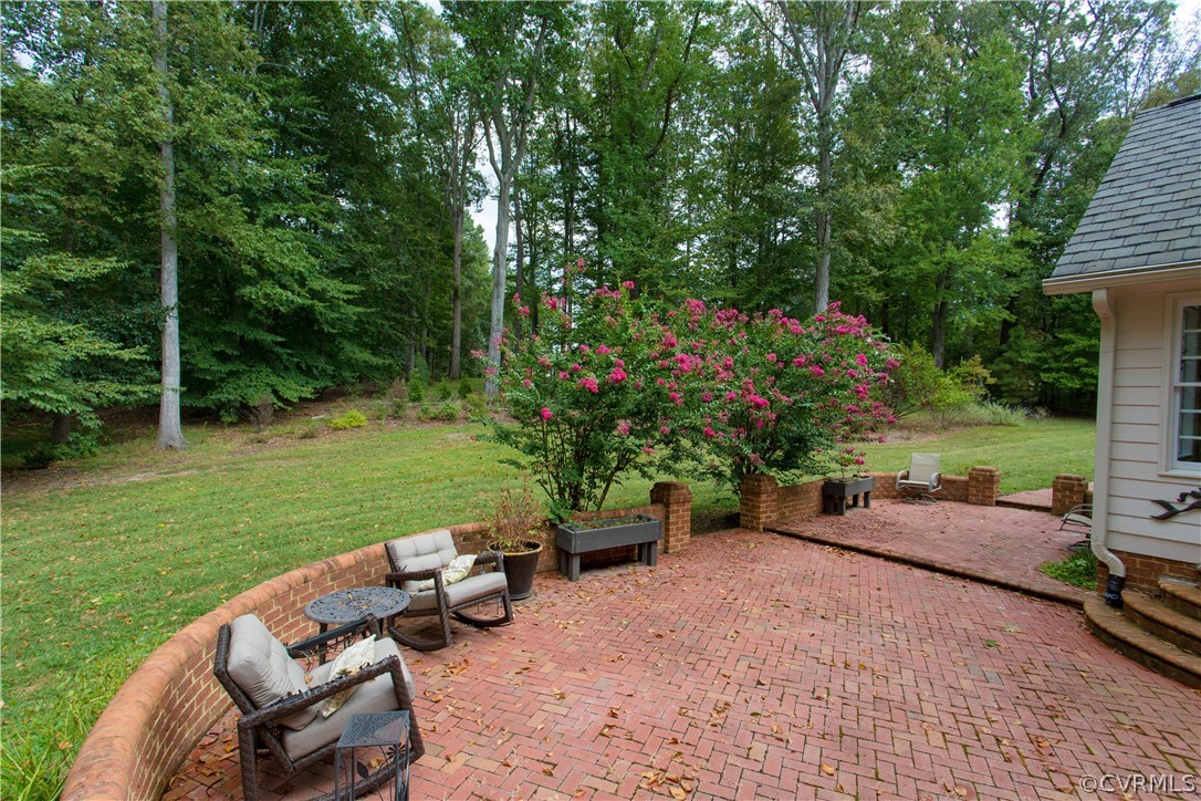 3613 Salles Ridge Court Midlothian, VA 23113 - Photo 35 of 36 a view of a backyard with sitting area