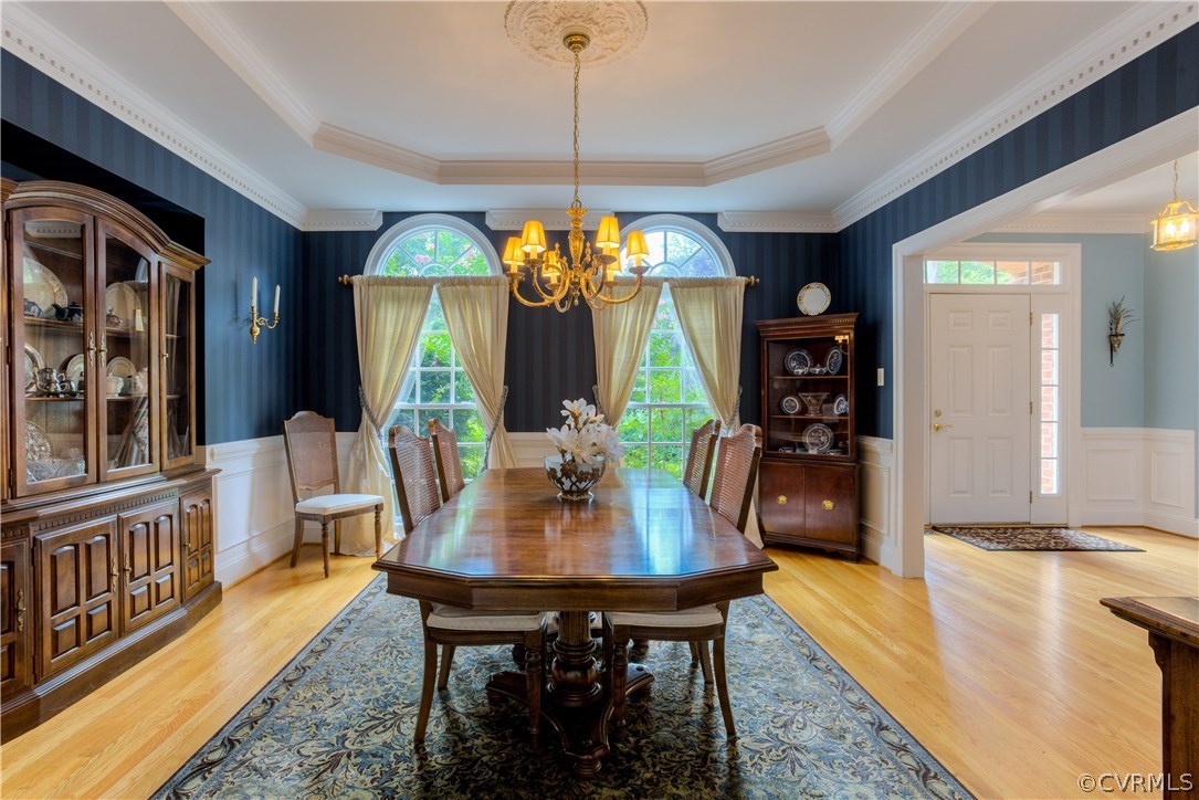 3613 Salles Ridge Court Midlothian, VA 23113 - Photo 7 of 36 a view of a dining room with furniture and a chandelier