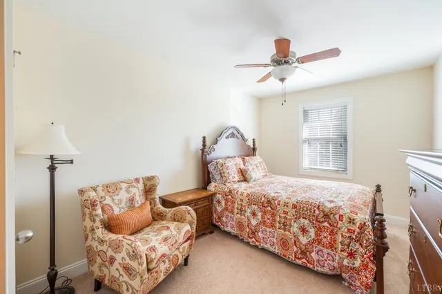 a car parked in front of a white building