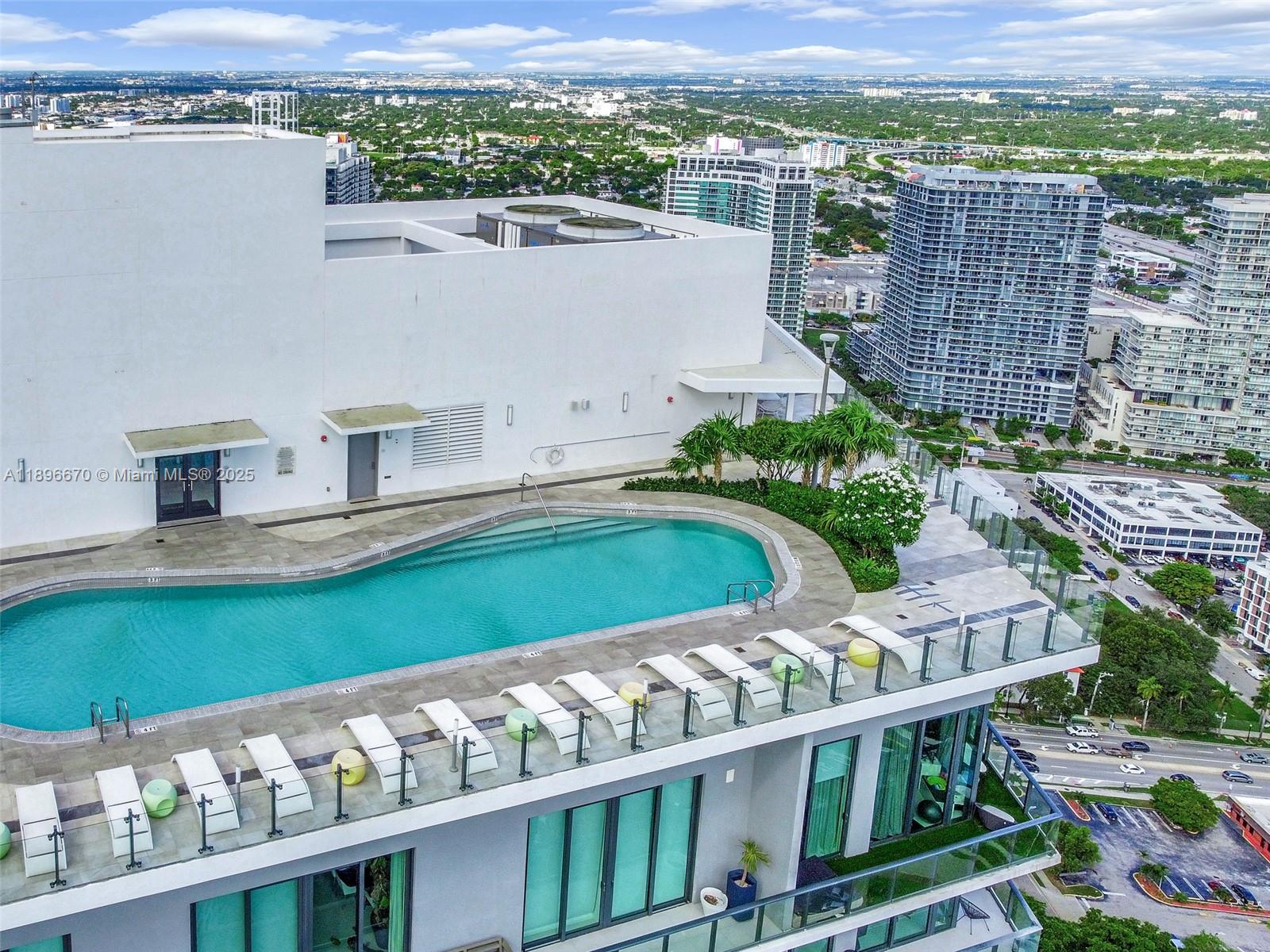 501 Northeast 31st Street, Unit 602 Miami, FL 33137 - Photo 22 of 38 a view of a city from a balcony