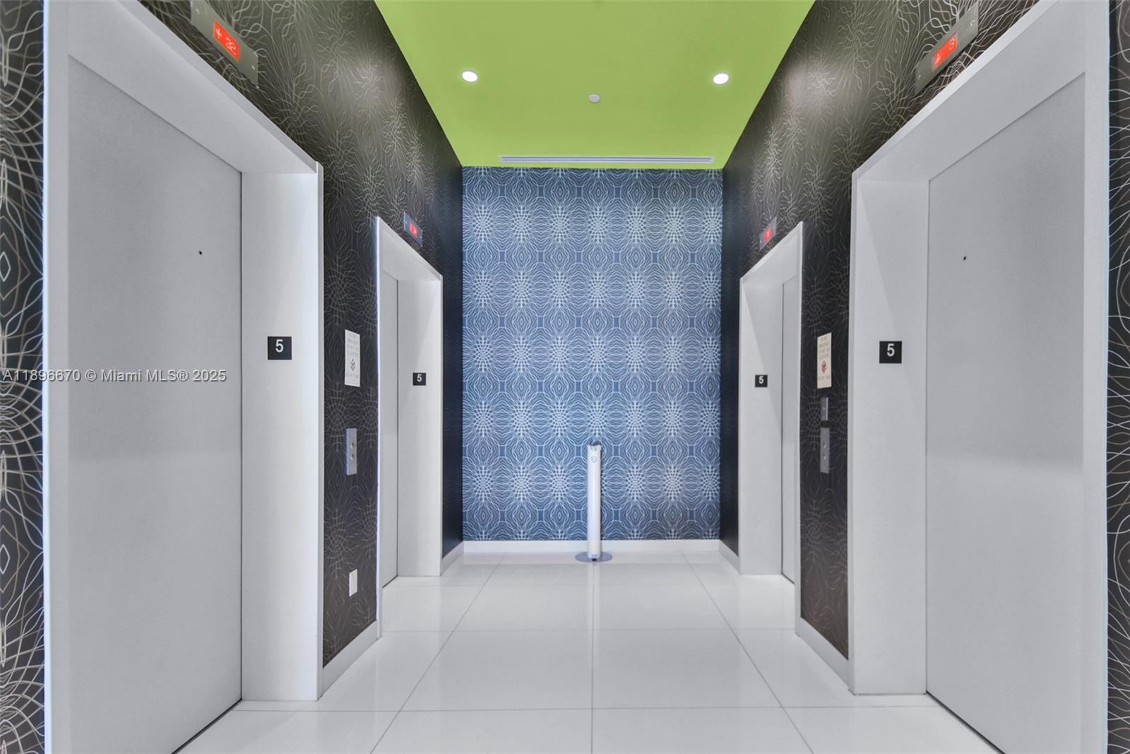 501 Northeast 31st Street, Unit 602 Miami, FL 33137 - Photo 26 of 38 a view of a hallway with wooden shelves