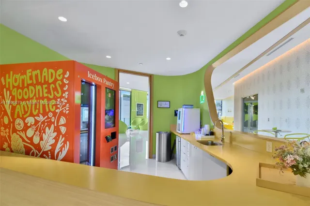 a view of a swimming pool with a patio and a yard