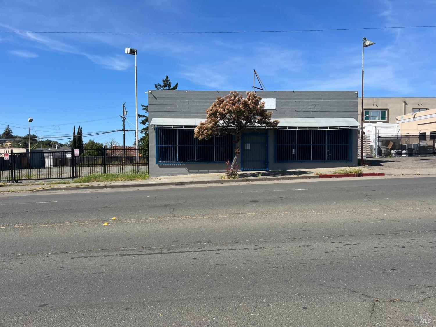 a view of a building with a street