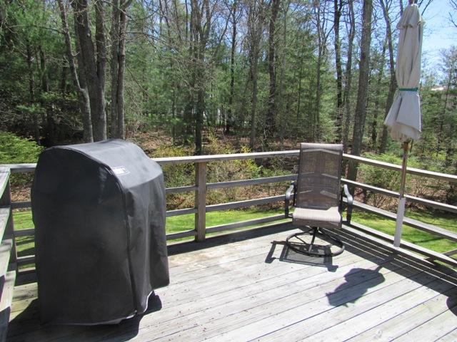 1 Keith Road Pocasset, MA 02559 - Photo 11 of 25 a view of roof deck with wooden floor and seating space