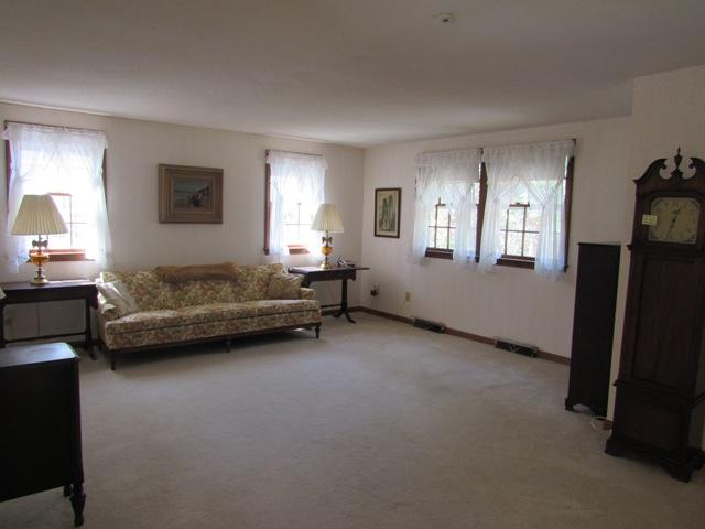 1 Keith Road Pocasset, MA 02559 - Photo 5 of 25 a living room with furniture and a window