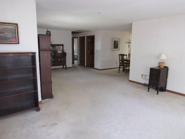 1 Keith Road Pocasset, MA 02559 - Photo 10 of 25 a view of a livingroom with furniture and a cabinet