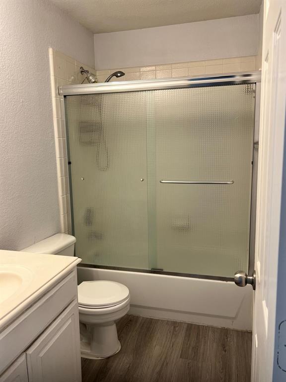 4312 Ridge Point Lane Plano, TX 75024 - Photo 8 of 16 a bathroom with a toilet and a shower