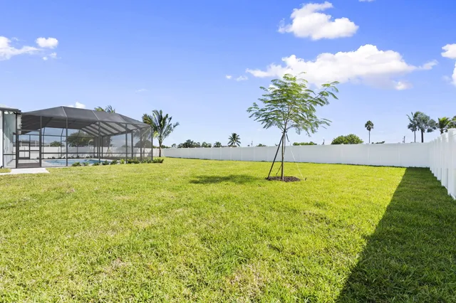 $650,000 | 5761 Northwest Cone Street, Port St. Lucie, FL 34986