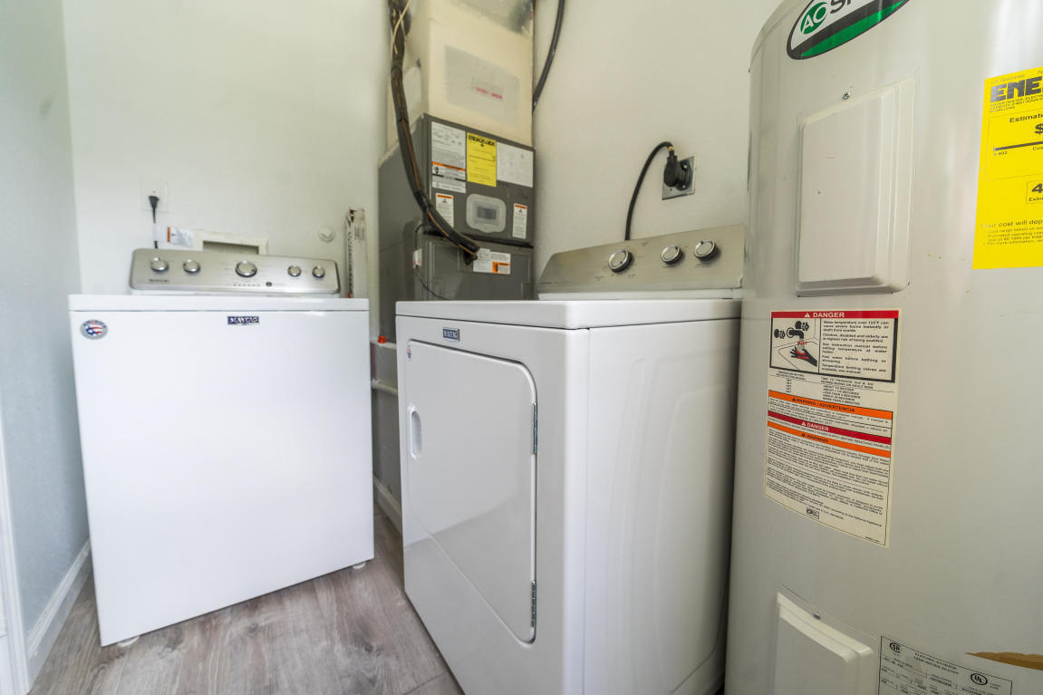 507 Northwest 3rd Street Delray Beach, FL 33444 - Photo 11 of 30 a utility room with dryer and washer
